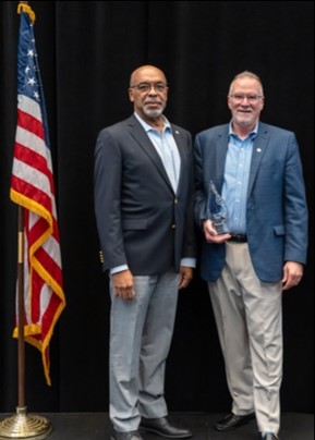 George Bradner receives National Award for Outstanding Service