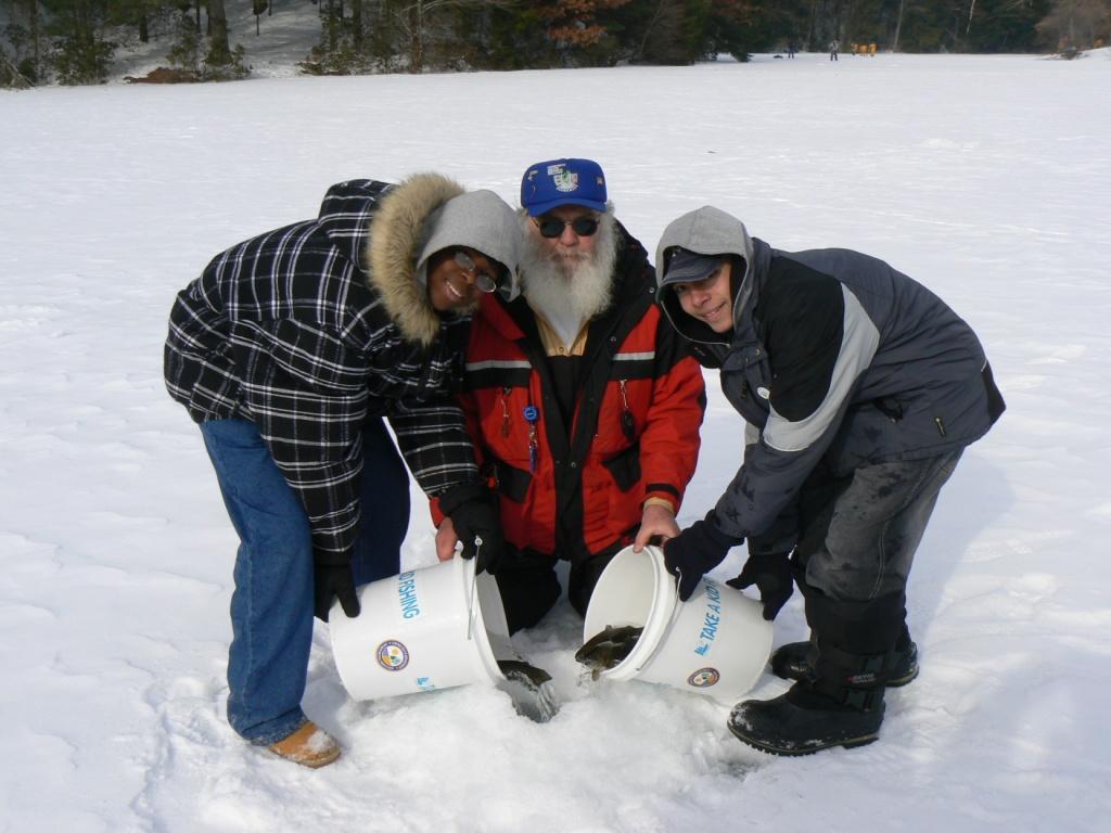 CARE instructor stocking trout